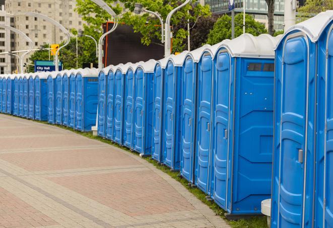 colorful portable restrooms available for rent at a local fair or carnival in Babylon NY